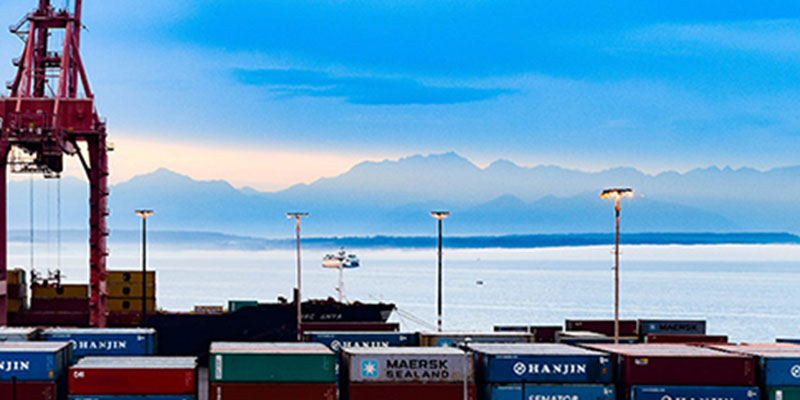 Port of Tacoma with mountains in the background